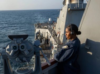 Boatswain's Mate Seaman Amiah Rose stands watch on the bridge wing of the Arleigh Burke-class guided-missile destroyer USS Mason while the ship operates in support of Operation Prosperity Guardian (OPG) in the Red Sea, January 3, 2024.