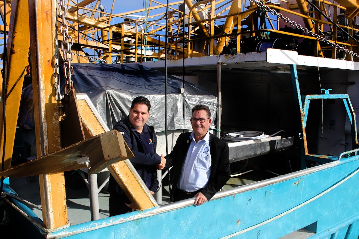 WAFIC CEO John Harrison and Recfishwest CEO Andrew Rowland unite aboard a scallop boat in Fremantle to support Commonwealth Marine Park management plans